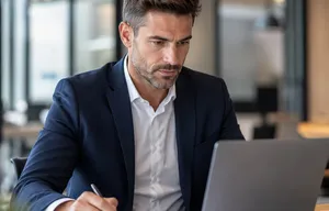 Procurement director reviewing supplier allocation in an office.