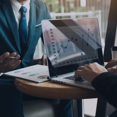 Business owners analyzing the company's operational excellence. Business owners analyzing the company's operational excellence.